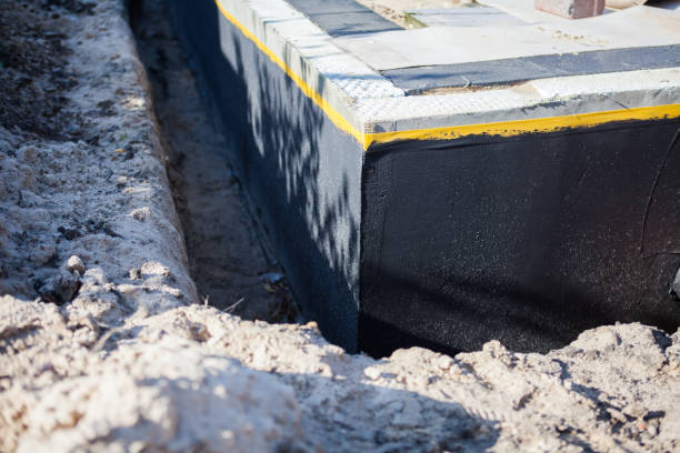 Professional Waterproofing technician working in Arlington Heights, PA